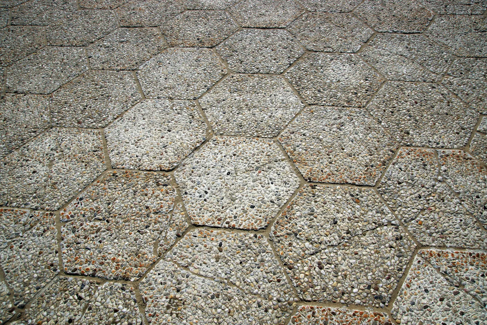 Interlocking paver patio laid in a running bond stagger with tight joints